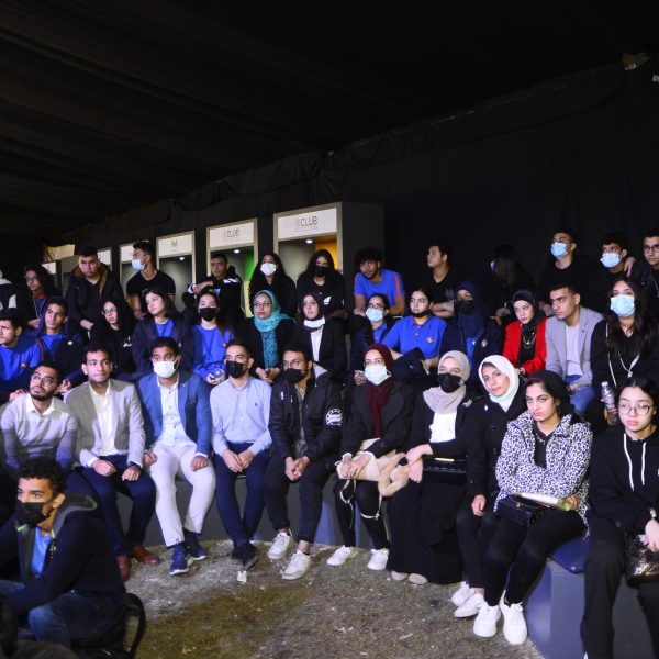 "Students presenting their project on stage during Al Alfi youth innovation program "