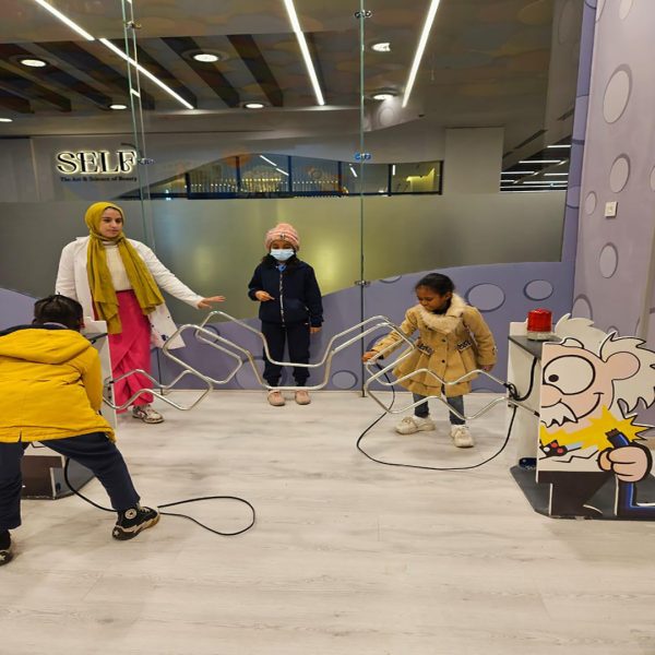 Students participating in a UNHCR physical play activity designed to support holistic child development